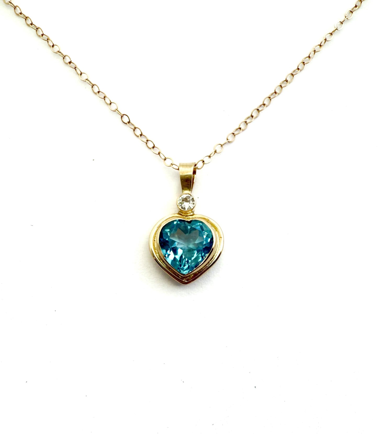 Blue Topaz Heart Pendant with Diamond Accent in 14k Gold