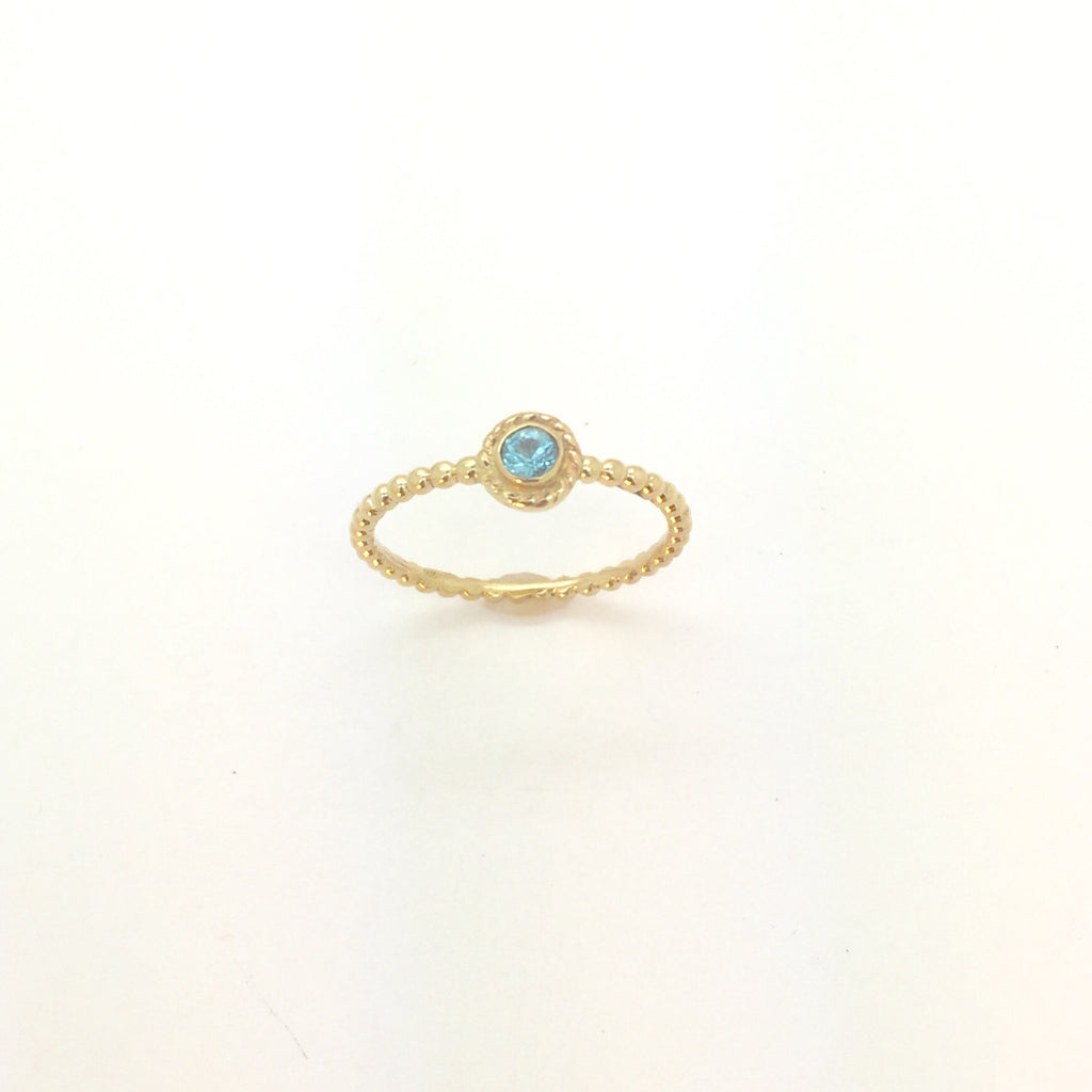 Gold ring in 14K with Blue Topaz