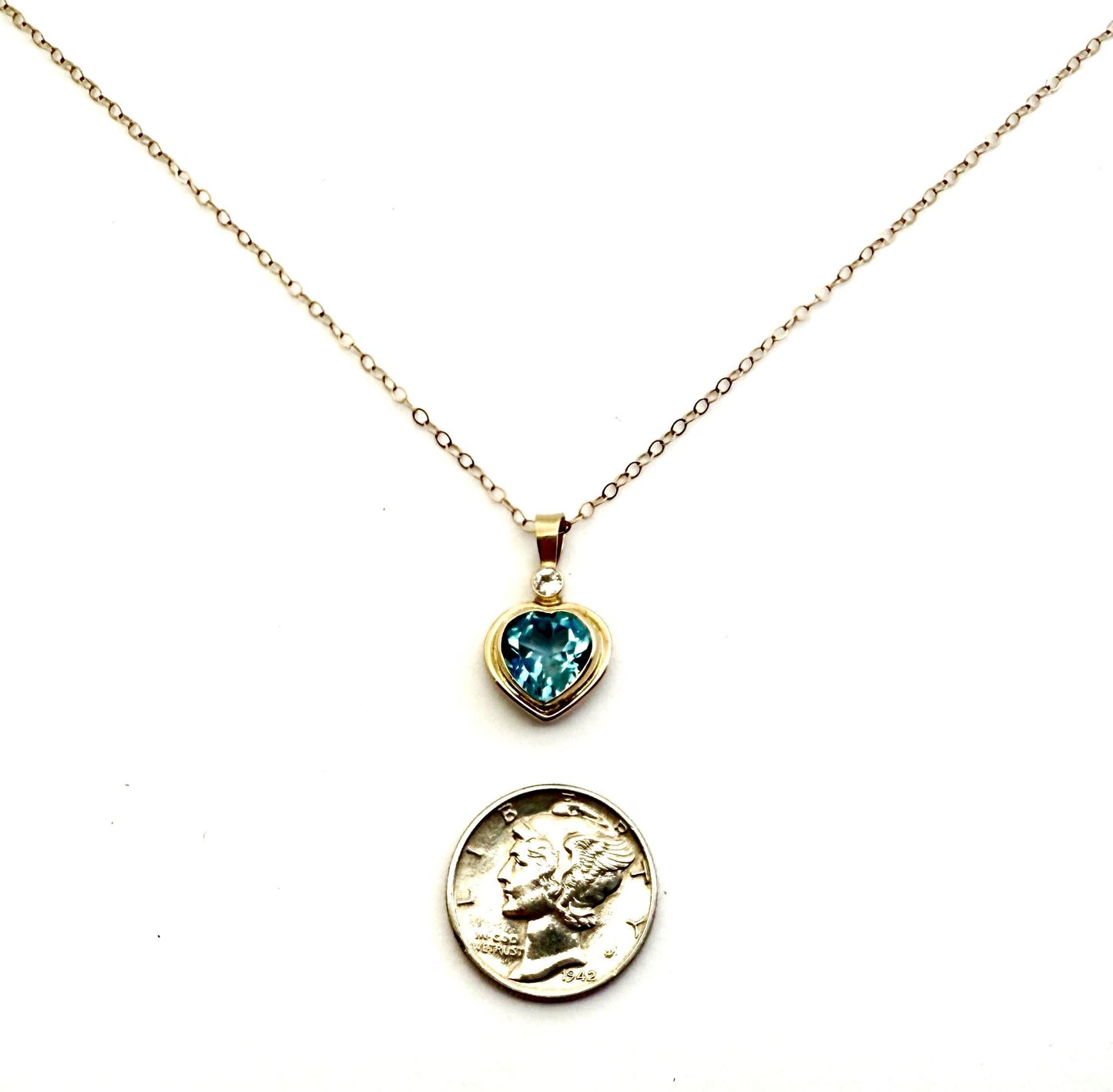 Blue Topaz Heart Pendant with Diamond Accent in 14k Gold