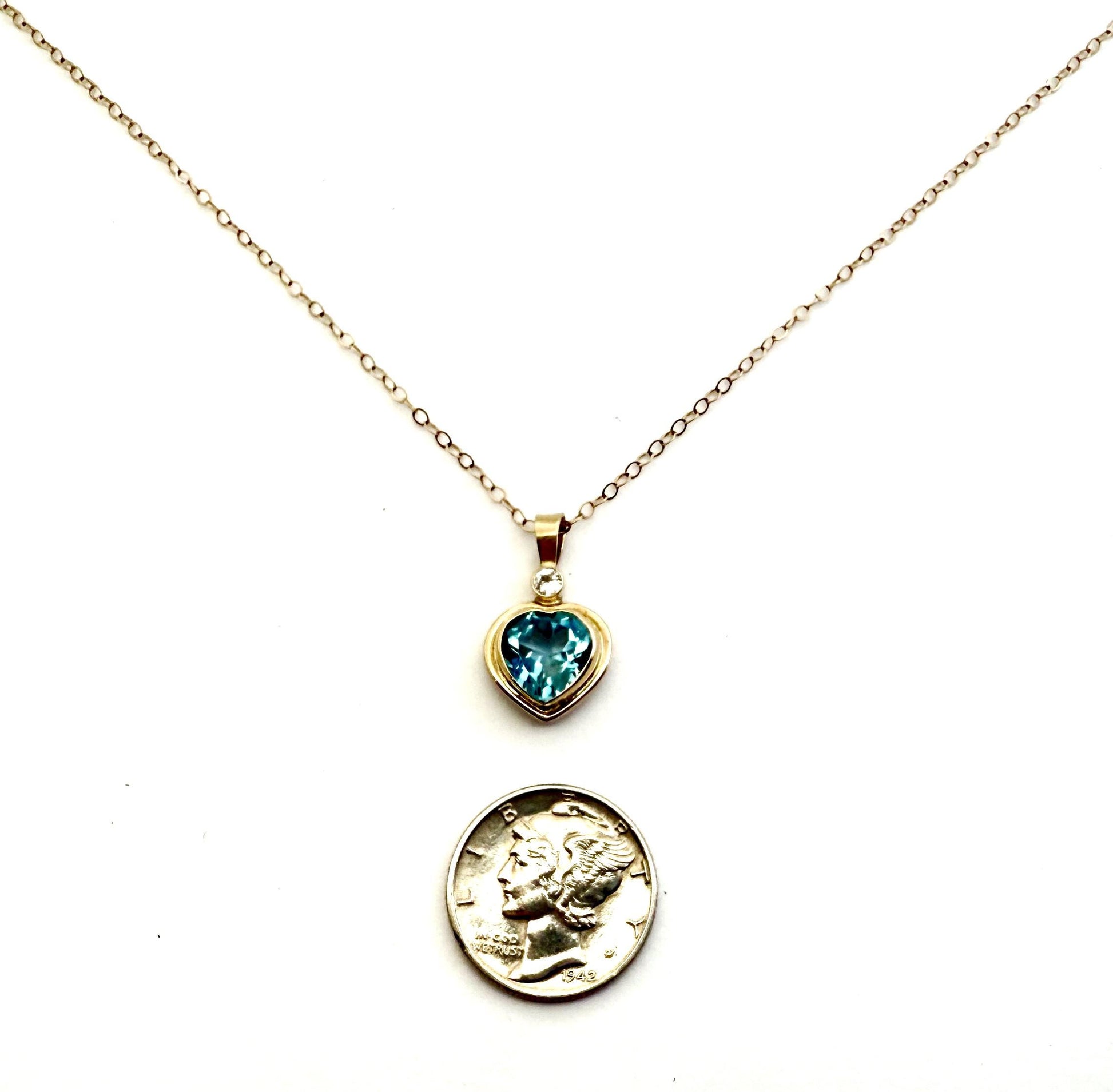 Blue Topaz Heart Pendant with Diamond Accent in 14k Gold