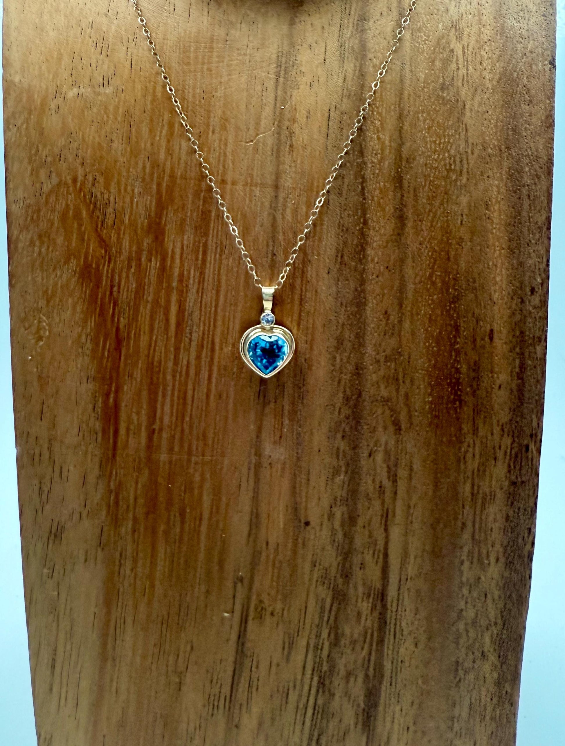 Blue Topaz Heart Pendant with Diamond Accent in 14k Gold