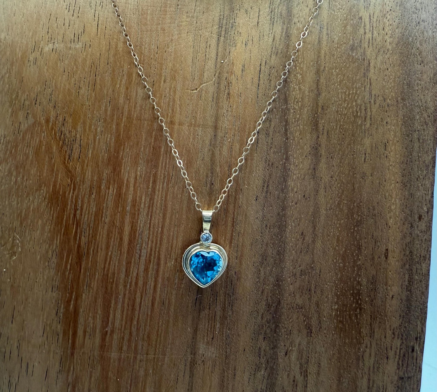 Blue Topaz Heart Pendant with Diamond Accent in 14k Gold