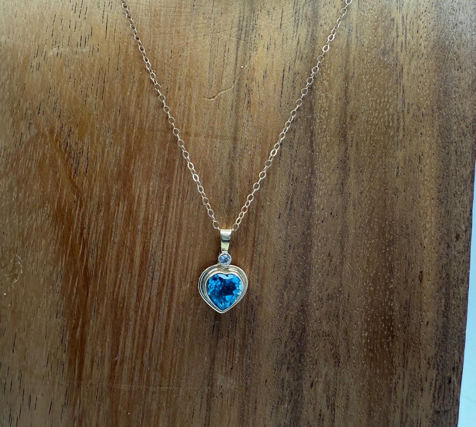 Blue Topaz Heart Pendant with Diamond Accent in 14k Gold