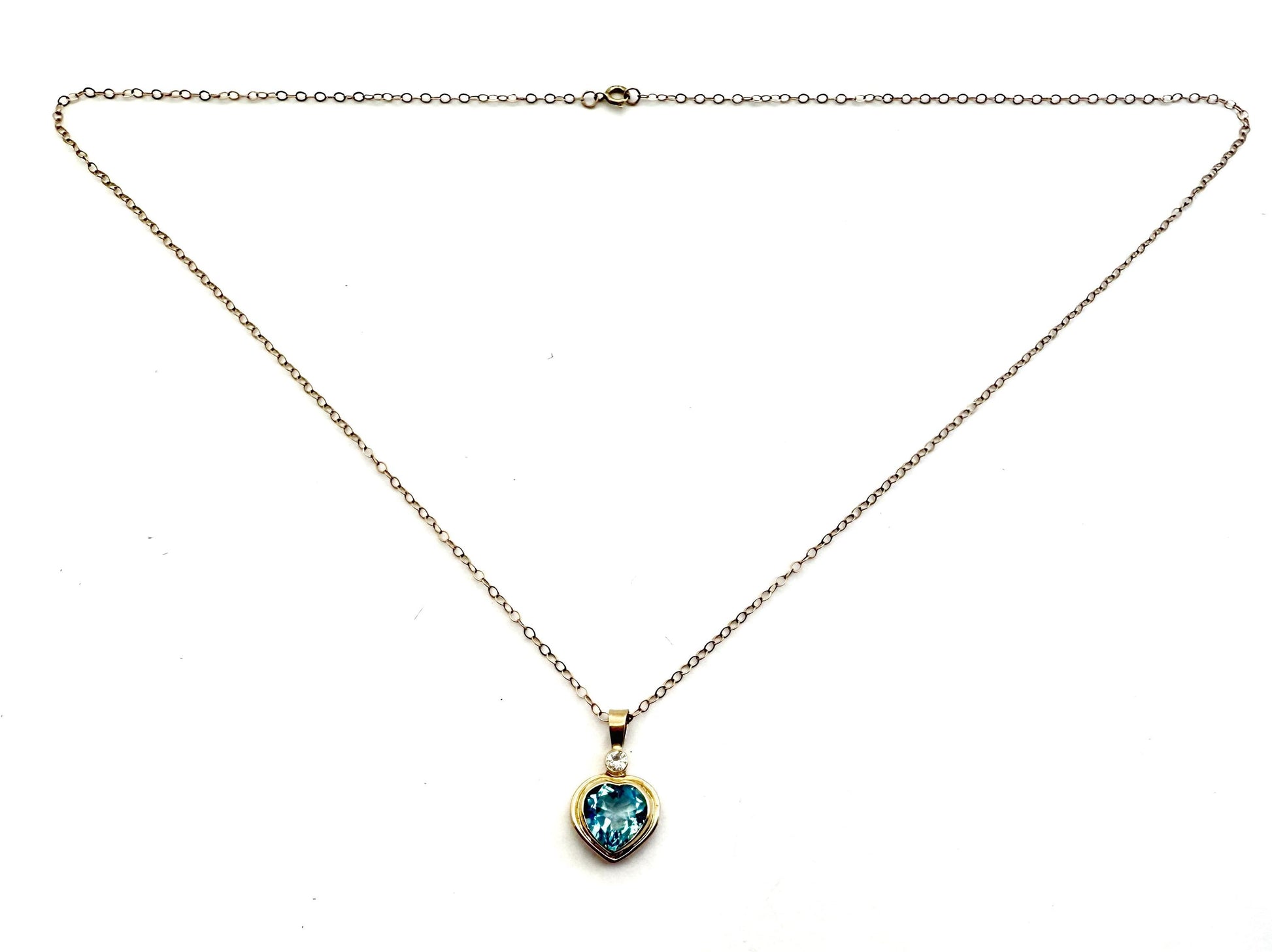 Blue Topaz Heart Pendant with Diamond Accent in 14k Gold