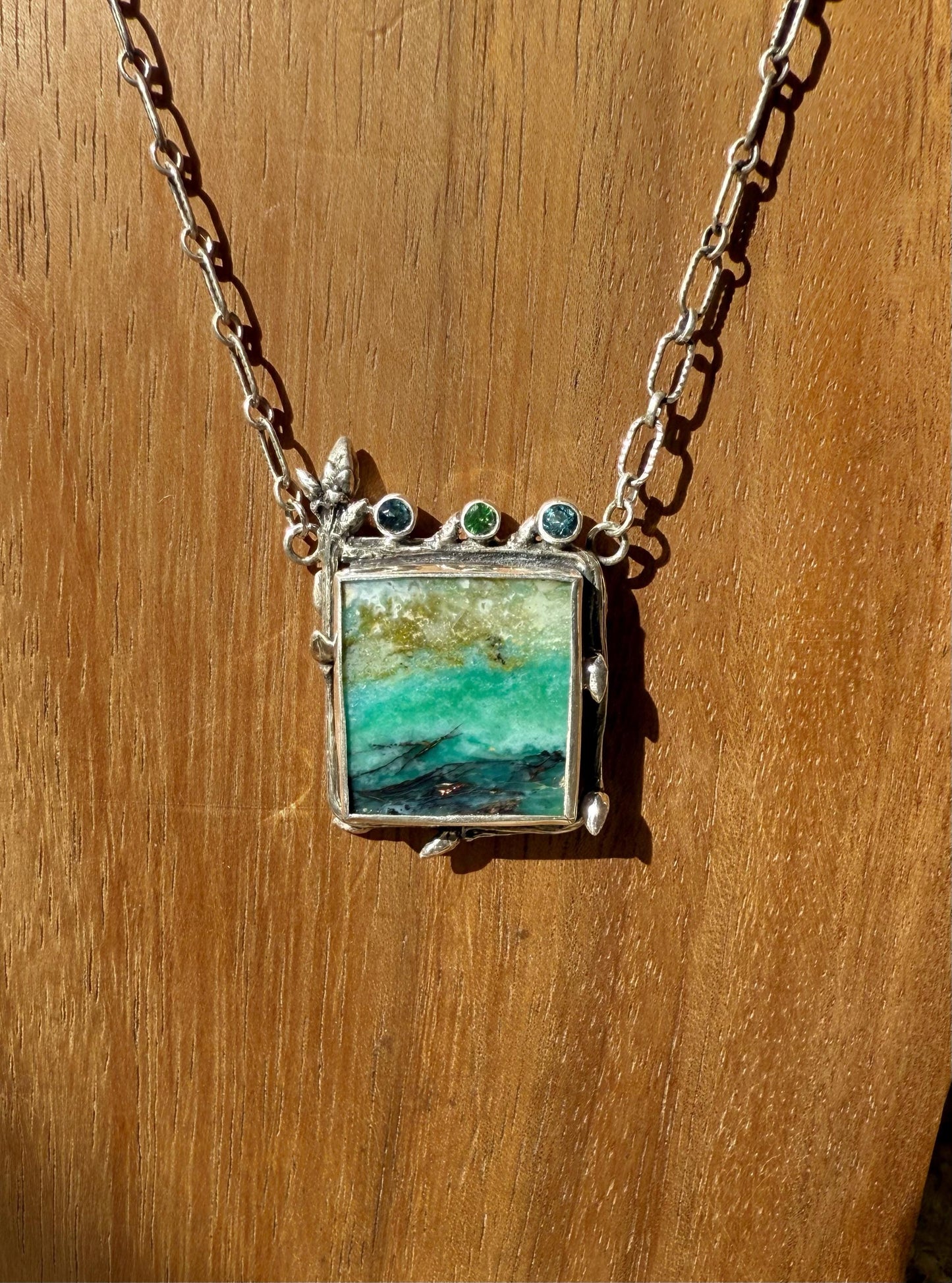 Indonesian Opalized Wood Necklace in Sterling Silver with Blue Topaz and Tsavorite Garnet