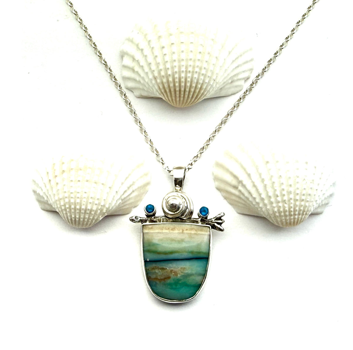 Opalized wood with kyanite in sterling silver pendant