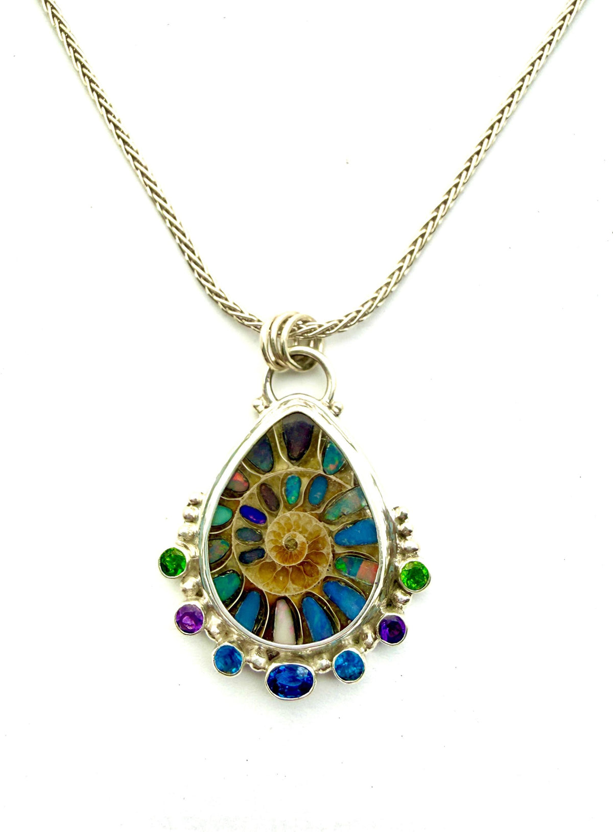 Ammonite Fossil Inlaid with Ethiopian Opals and Accented with gemstones