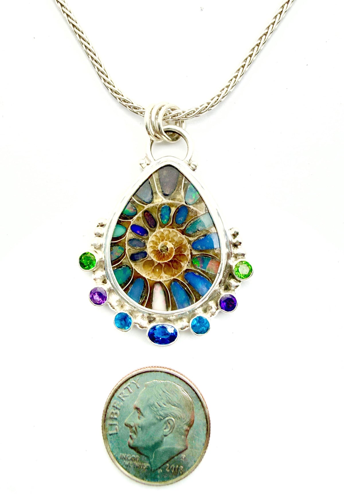 Ammonite Fossil Inlaid with Ethiopian Opals and Accented with gemstones