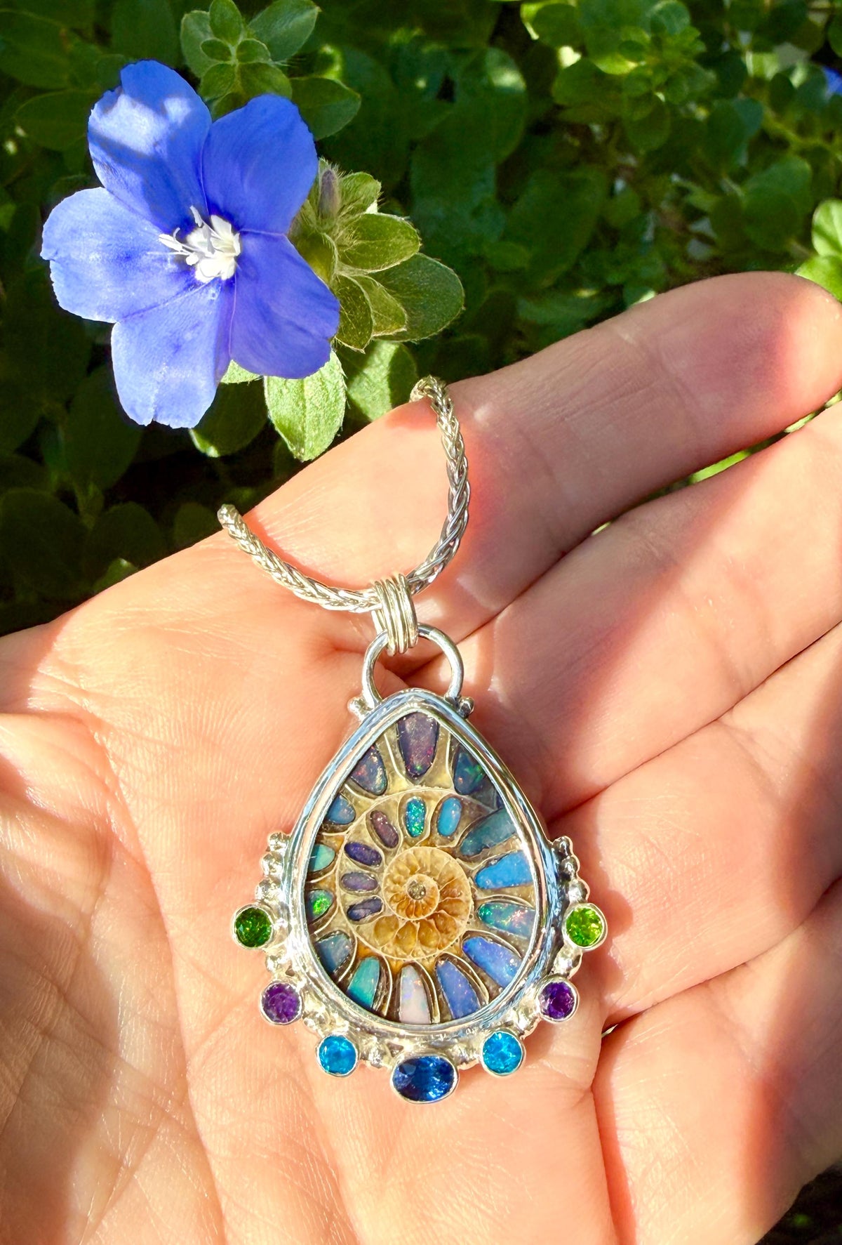 Ammonite Fossil Inlaid with Ethiopian Opals and Accented with gemstones