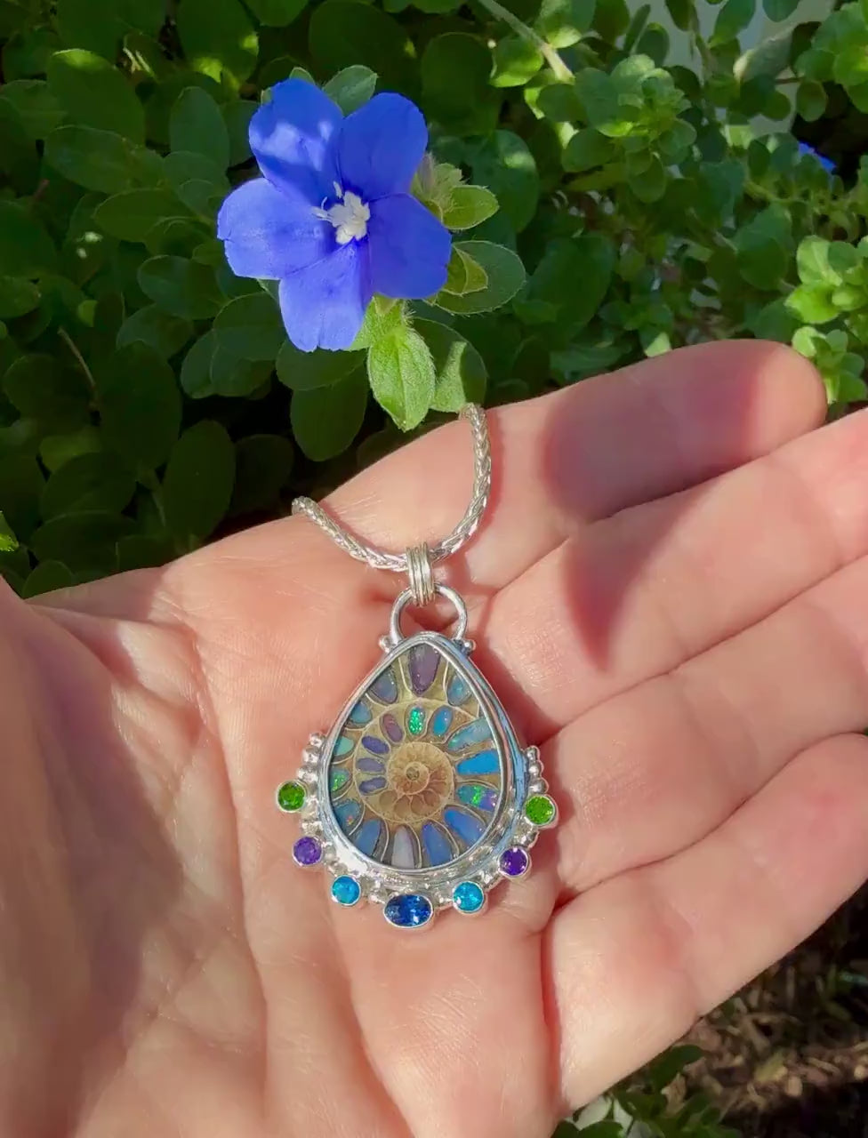 Ammonite Fossil Inlaid with Ethiopian Opals and Accented with gemstones