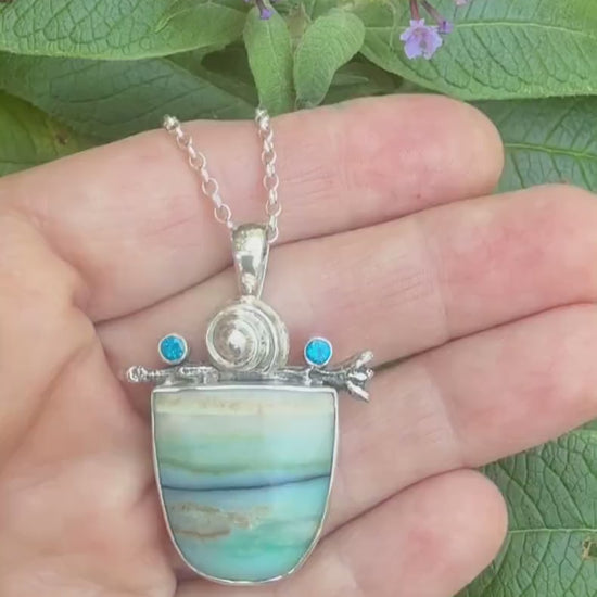 Opalized wood with kyanite  in sterling silver pendant