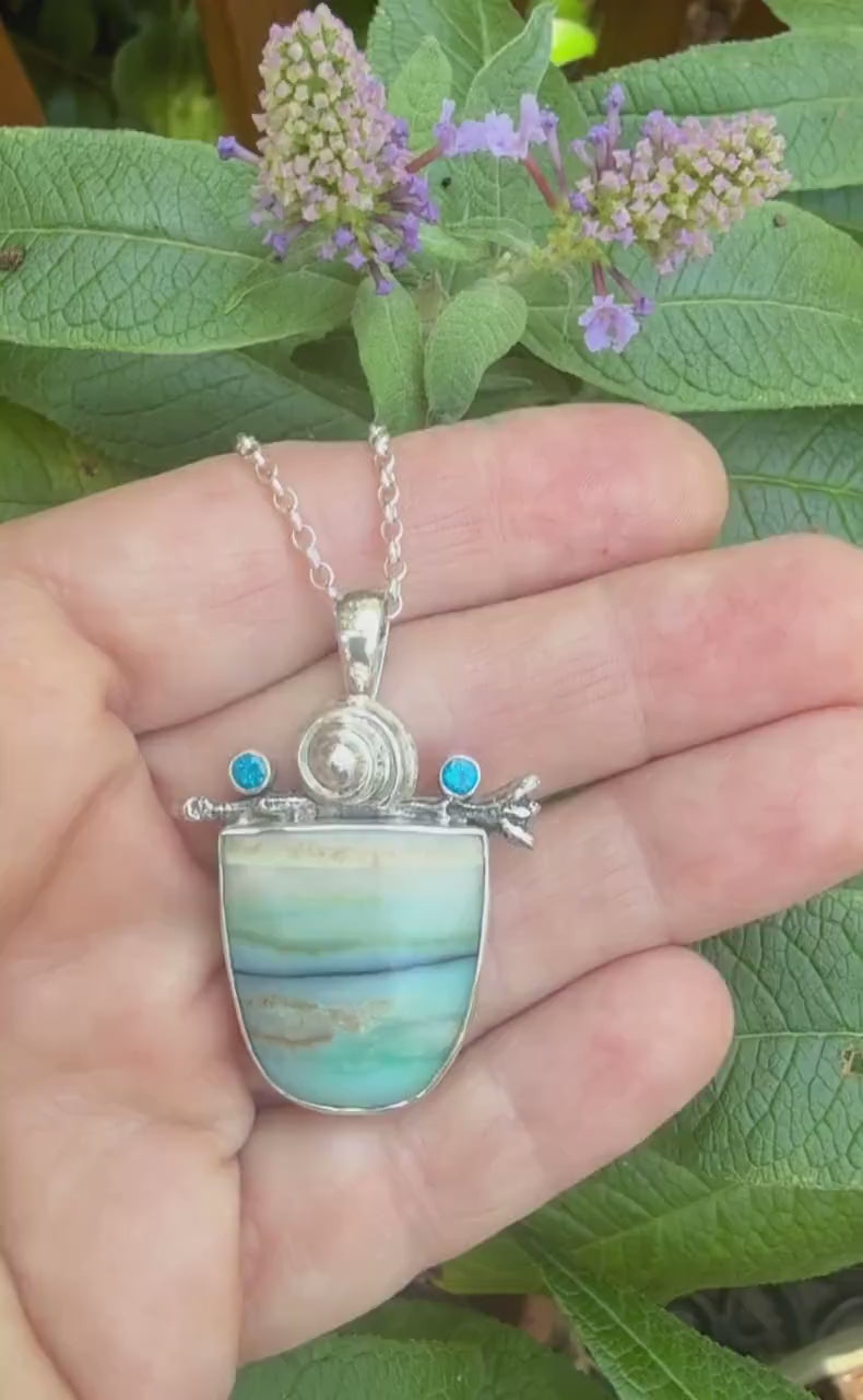 Opalized wood with kyanite  in sterling silver pendant