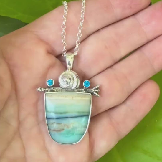 Opalized wood with kyanite  in sterling silver pendant