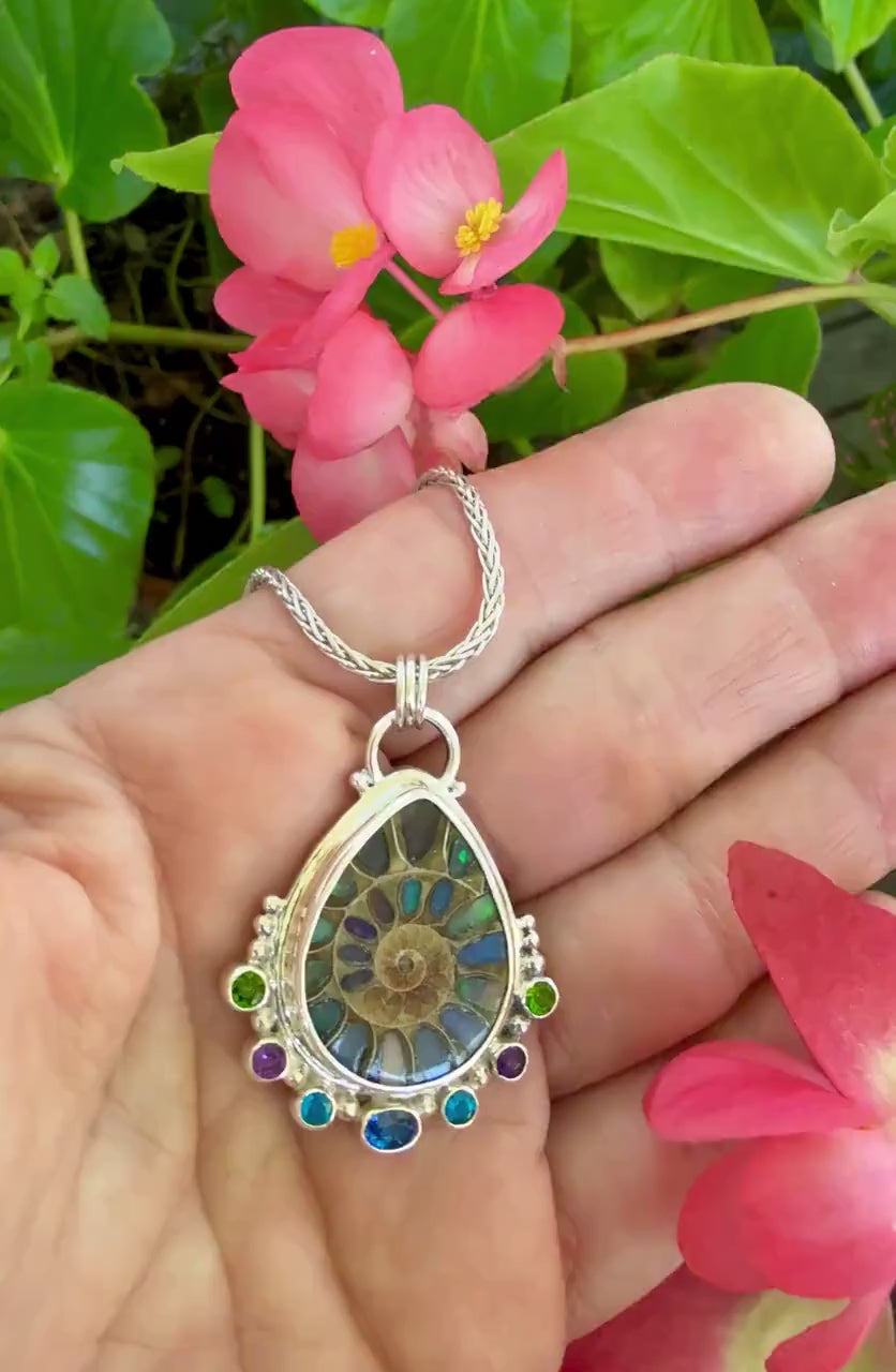 Ammonite Fossil Inlaid with Ethiopian Opals and Accented with gemstones